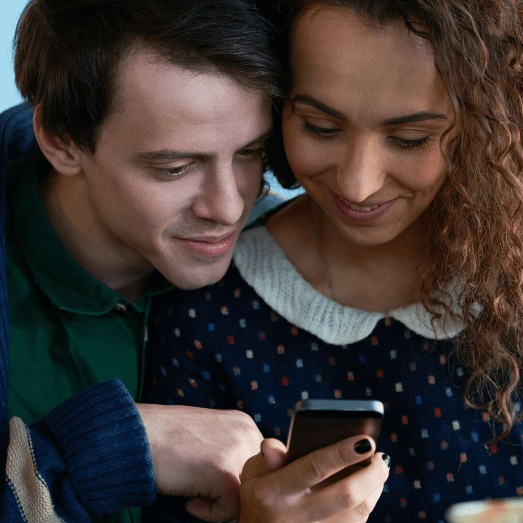 photo for wife and husband checking status of softener using their mobile